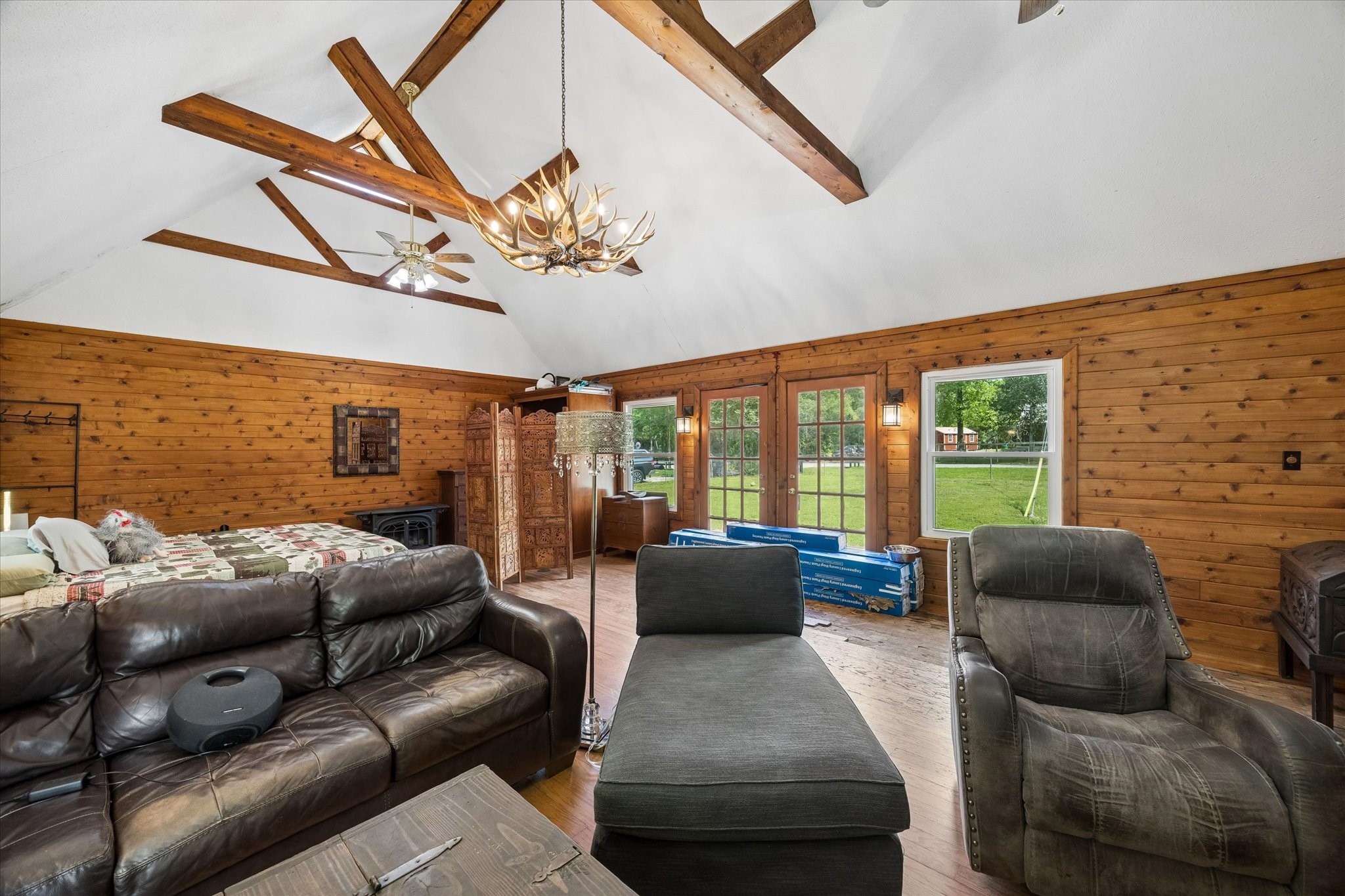 438 Havard Road, Unit 2 Huffman, TX 77336 - Photo 8 of 10 a living room with furniture a ceiling fan and a large window