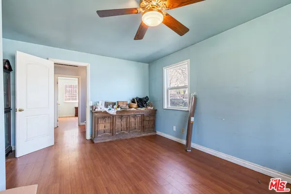 a view of workspace with wooden floor