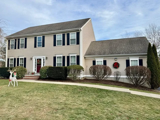 a front view of a house with yard
