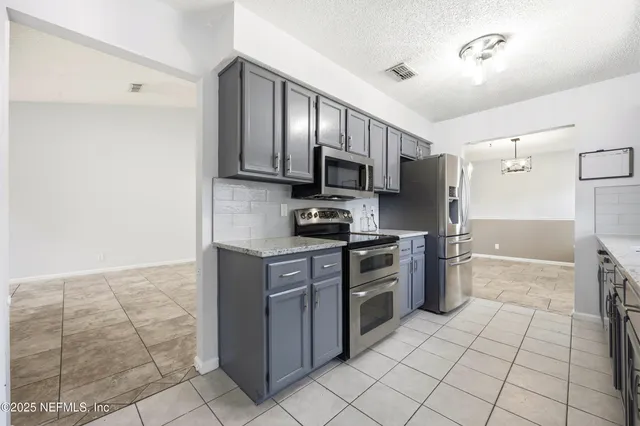 $464,990 | 14049 Broken Bow Drive North, Jacksonville, FL 32225