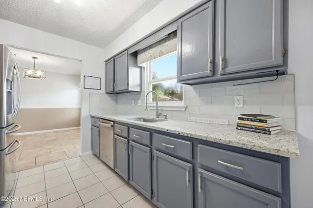 $464,990 | 14049 Broken Bow Drive North, Jacksonville, FL 32225