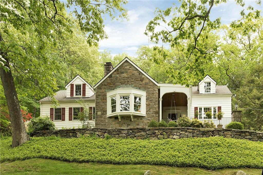 235 Cedarwood Road Stamford, CT 06903 - Photo 1 of 1 front view of a house with a yard
