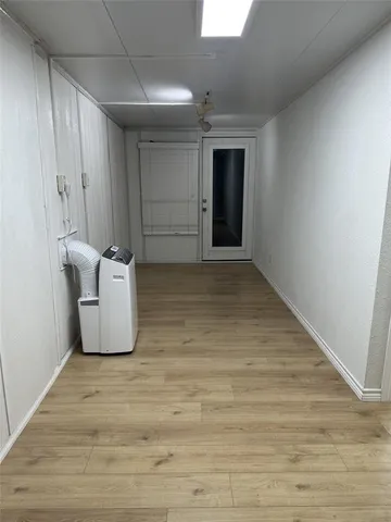 a view of a room with an empty space