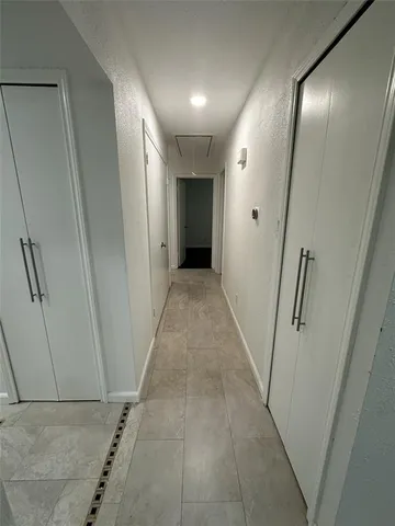 a view of hallway with stairs