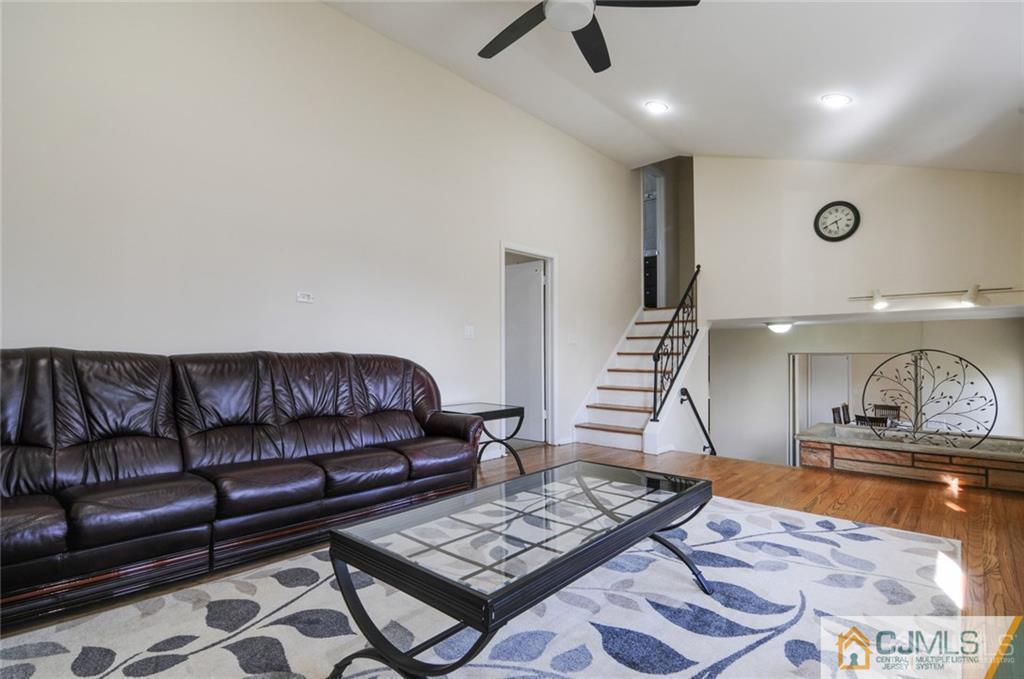 62 Gage Road East Brunswick, NJ 08816 - Photo 7 of 23 a living room with furniture and a rug