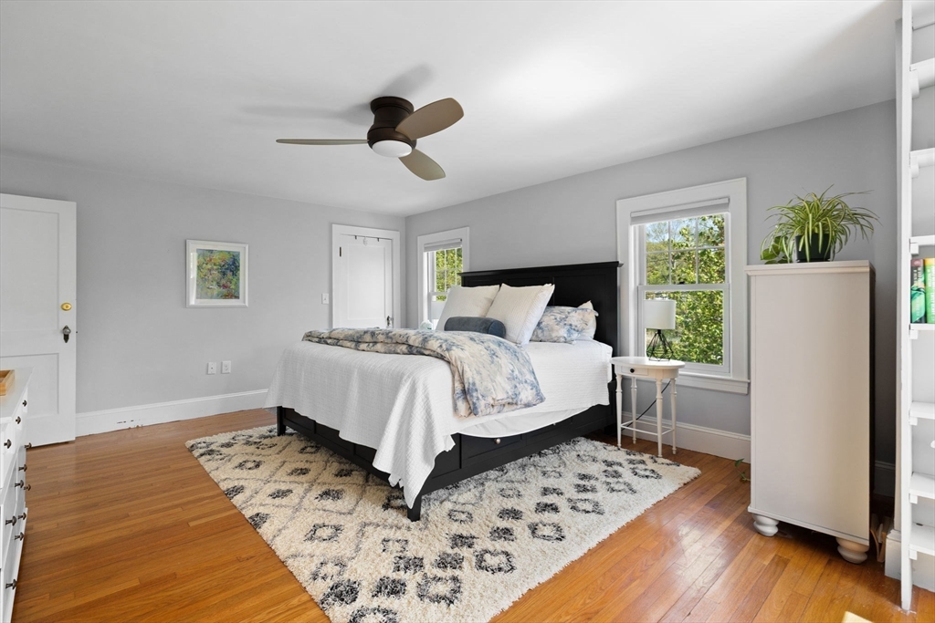 80 Baxter Street Melrose, MA 02176 - Photo 11 of 23 a bedroom with a bed and a window