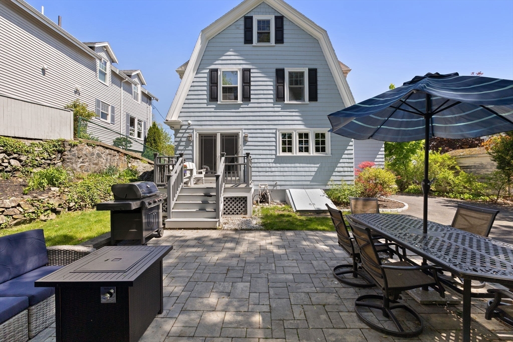 80 Baxter Street Melrose, MA 02176 - Photo 17 of 23 a view of a chairs and table in the patio