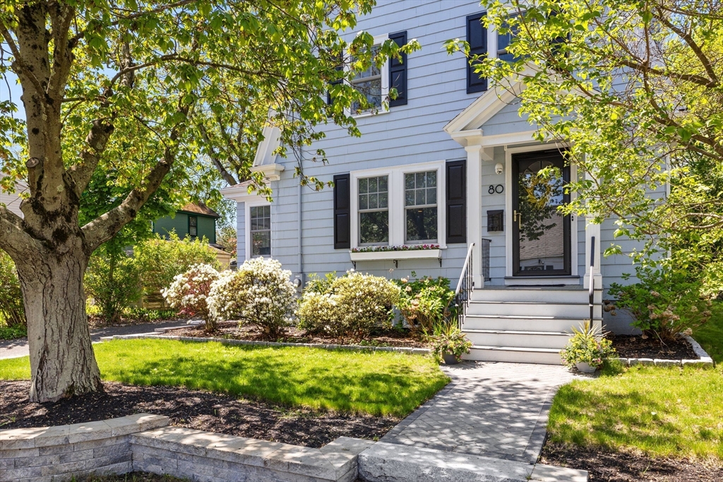 80 Baxter Street Melrose, MA 02176 - Photo 2 of 23 front view of a house with a yard