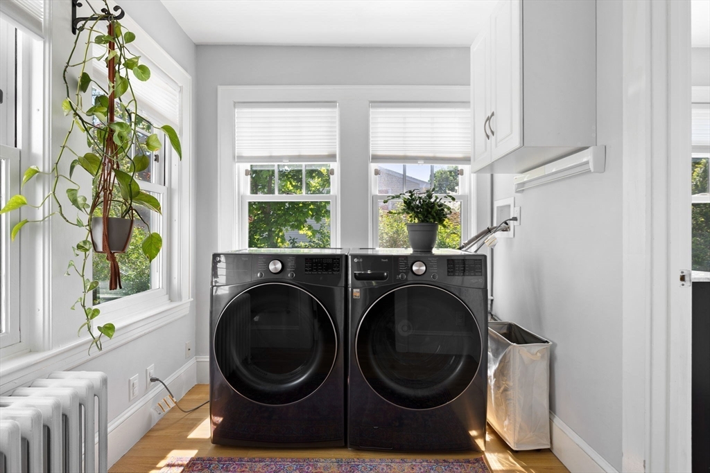 80 Baxter Street Melrose, MA 02176 - Photo 10 of 23 a utility room with dryer and washer