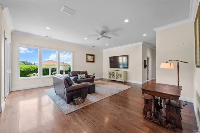 a view of a dining room with furniture and window