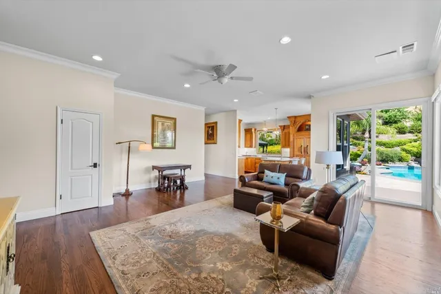 a bathroom with a granite countertop sink a mirror and a shower