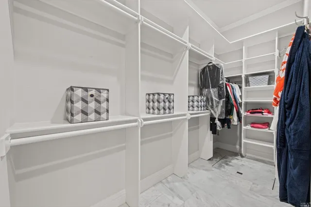 a view of a chairs and table in the patio