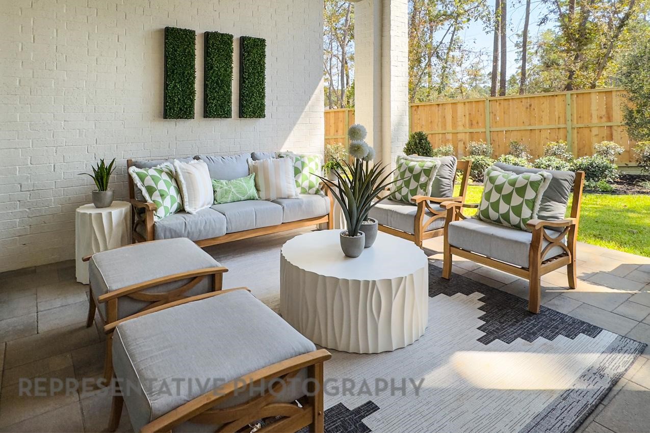 5402 Verona Ridge Drive Fulshear, TX 77406 - Photo 44 of 49 a living room with furniture and a potted plant