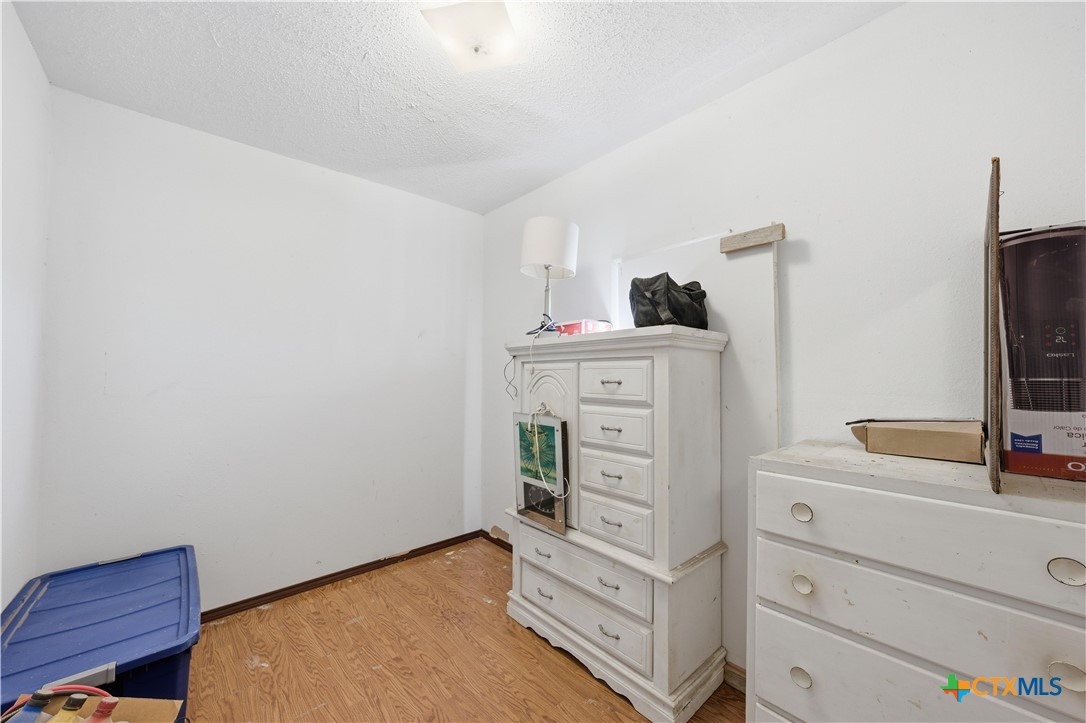 1780 Moores Mill Road Temple, TX 76504 - Photo 15 of 17 a room with storage and utility room