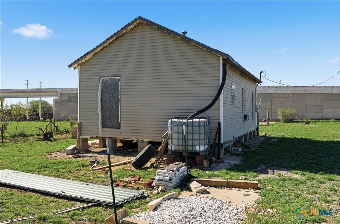 1780 Moores Mill Road Temple, TX 76504 - Photo 16 of 17 a front view of a house with garden