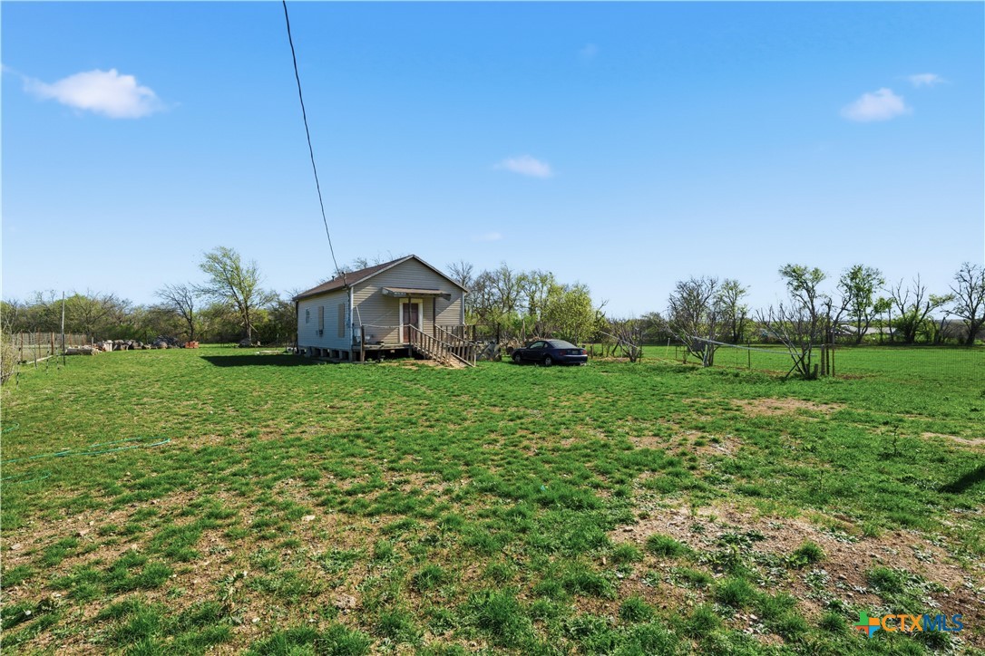 1780 Moores Mill Road Temple, TX 76504 - Photo 6 of 17 a front view of a house with garden
