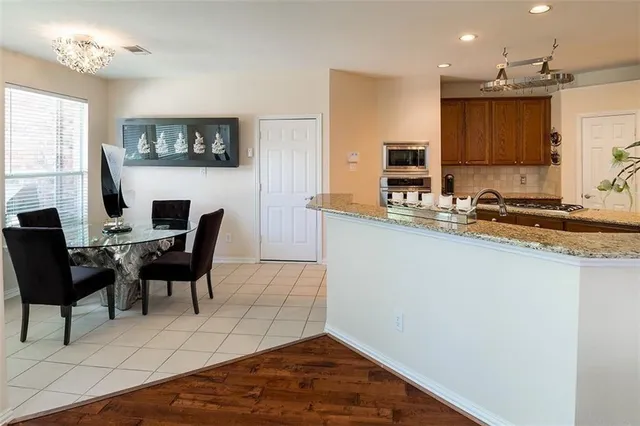 a view of a kitchen and dining room