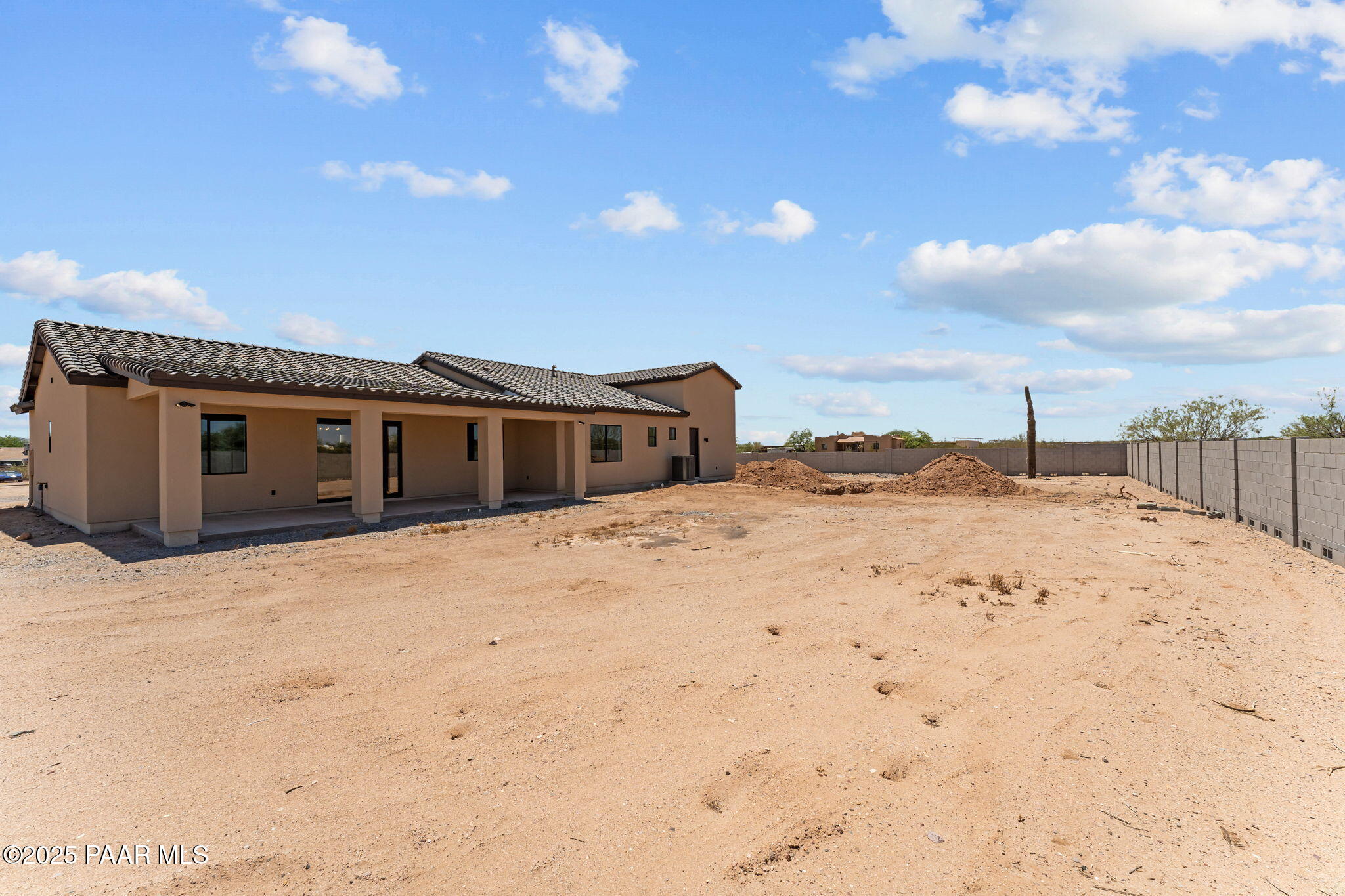 21032 West Skinner Road Wittmann, AZ 85361 - Photo 33 of 34 a view of a house with a snow in the yard