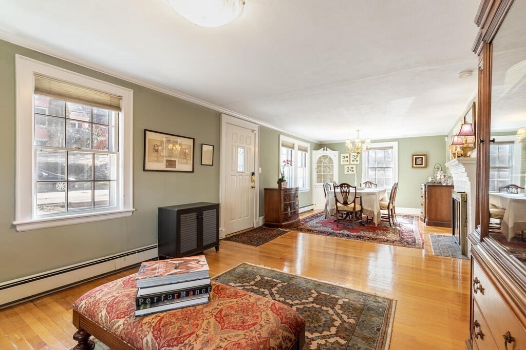 64 Wachusett Road Needham, MA 02492 - Photo 5 of 25 a living room with furniture and a flat screen tv