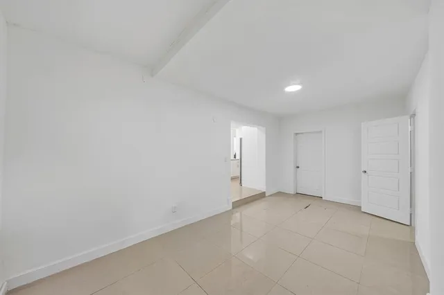 a bedroom with a bed and furniture