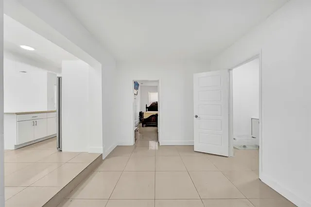a bathroom with a sink toilet and mirror