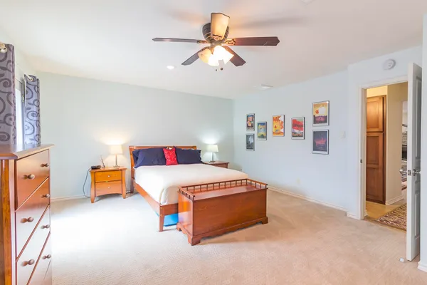a living room with furniture and a rug