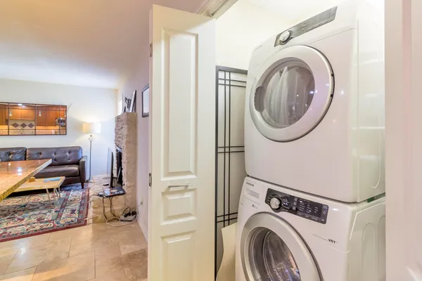 a spacious bathroom with double vanity sink and a mirror