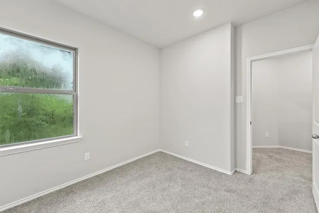 an empty room with a window