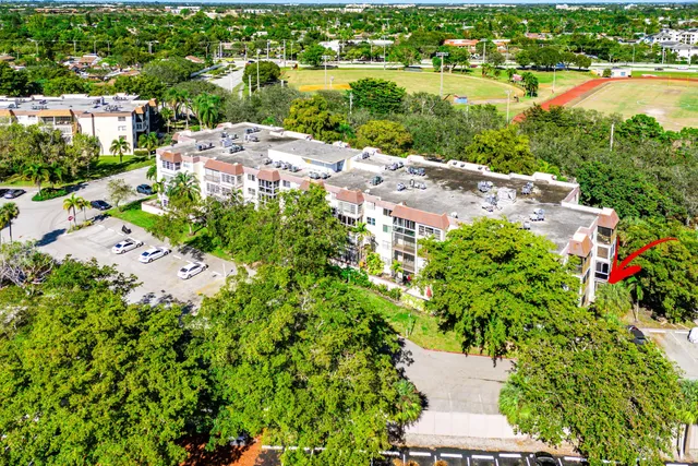 a backyard of a house with a yard and lake view