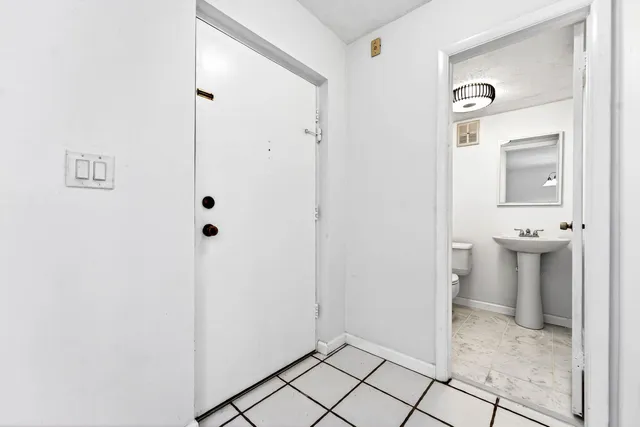 a bathroom with a sink and a toilet