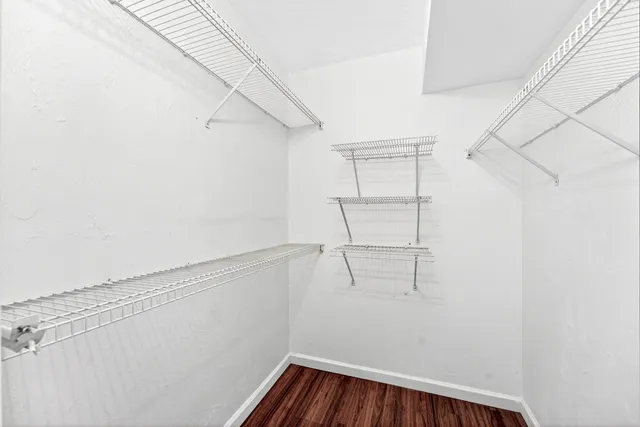 a view of a room with racks on the wall