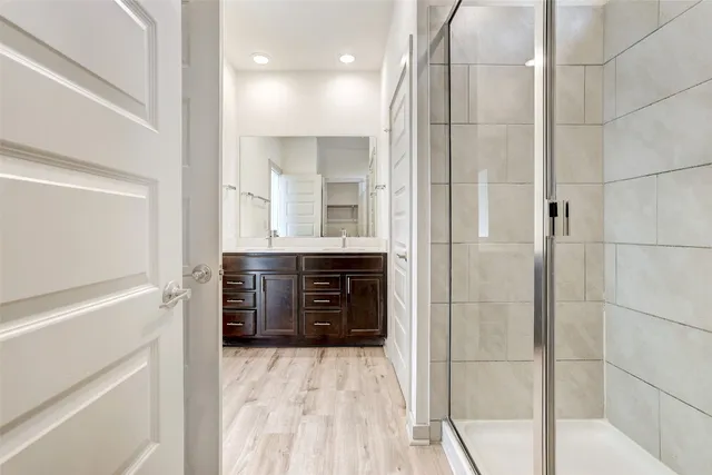 a bathroom with a sink a vanity and a mirror