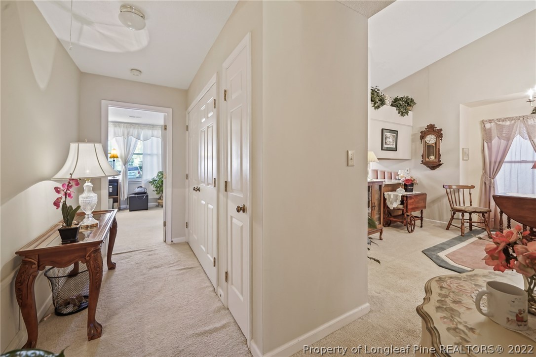4372 Bona Court Raleigh, NC 27604 - Photo 25 of 41 a living room with furniture and a wooden floor