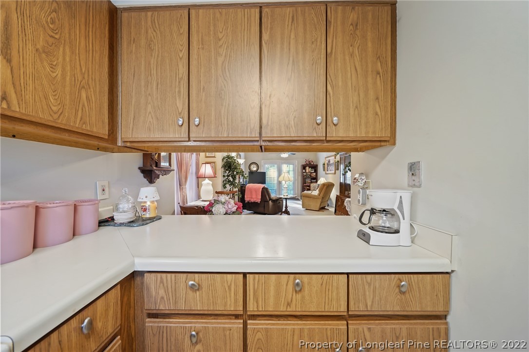 4372 Bona Court Raleigh, NC 27604 - Photo 9 of 41 a kitchen with a sink and cabinets