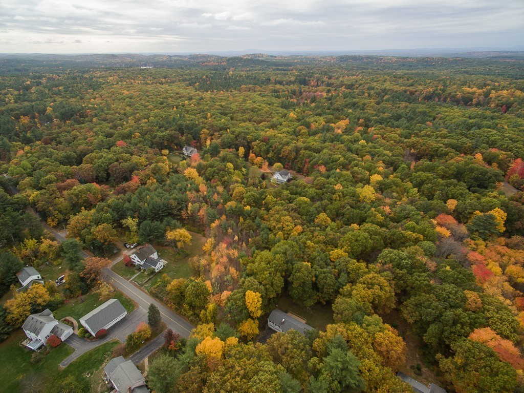 597 Old Dunstable Road Groton, MA 01450 - Photo 21 of 21 an aerial view of residential houses with outdoor space