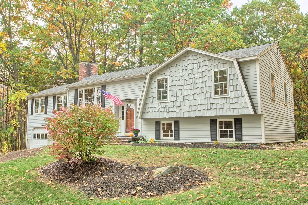 597 Old Dunstable Road Groton, MA 01450 - Photo 3 of 21 front view of a house with a yard