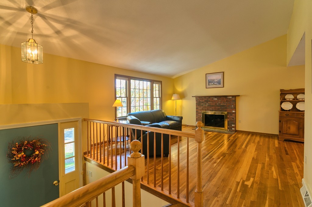 597 Old Dunstable Road Groton, MA 01450 - Photo 5 of 21 a view of livingroom with furniture and fireplace