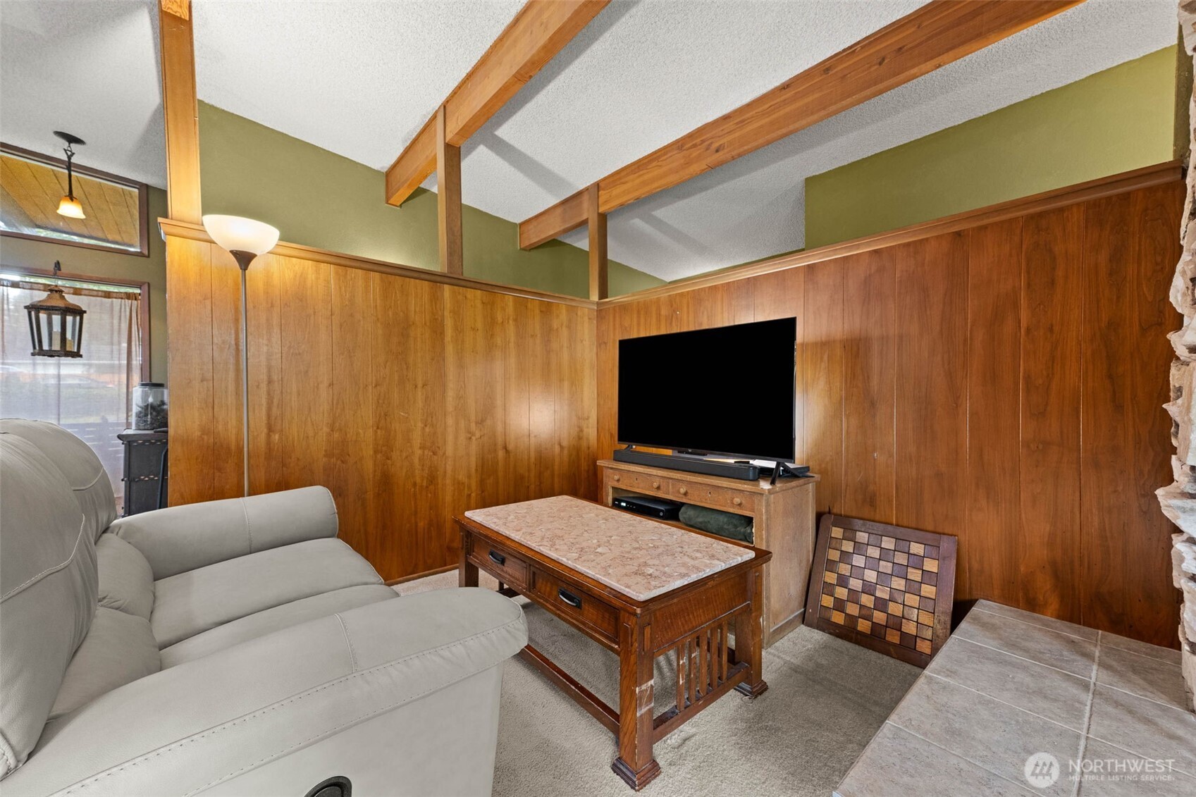 1007 Panorama Court Fircrest, WA 98466 - Photo 12 of 39 a living room with furniture and a flat screen tv