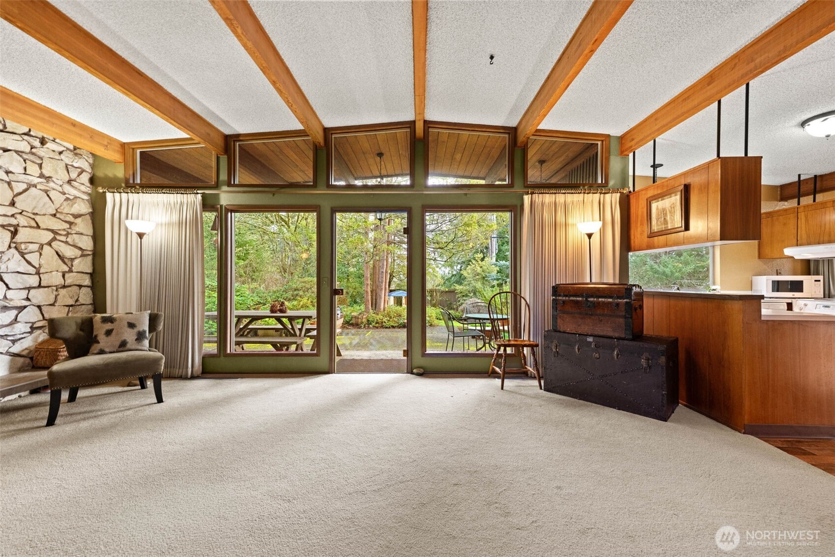1007 Panorama Court Fircrest, WA 98466 - Photo 13 of 39 a living room with furniture and a floor to ceiling window