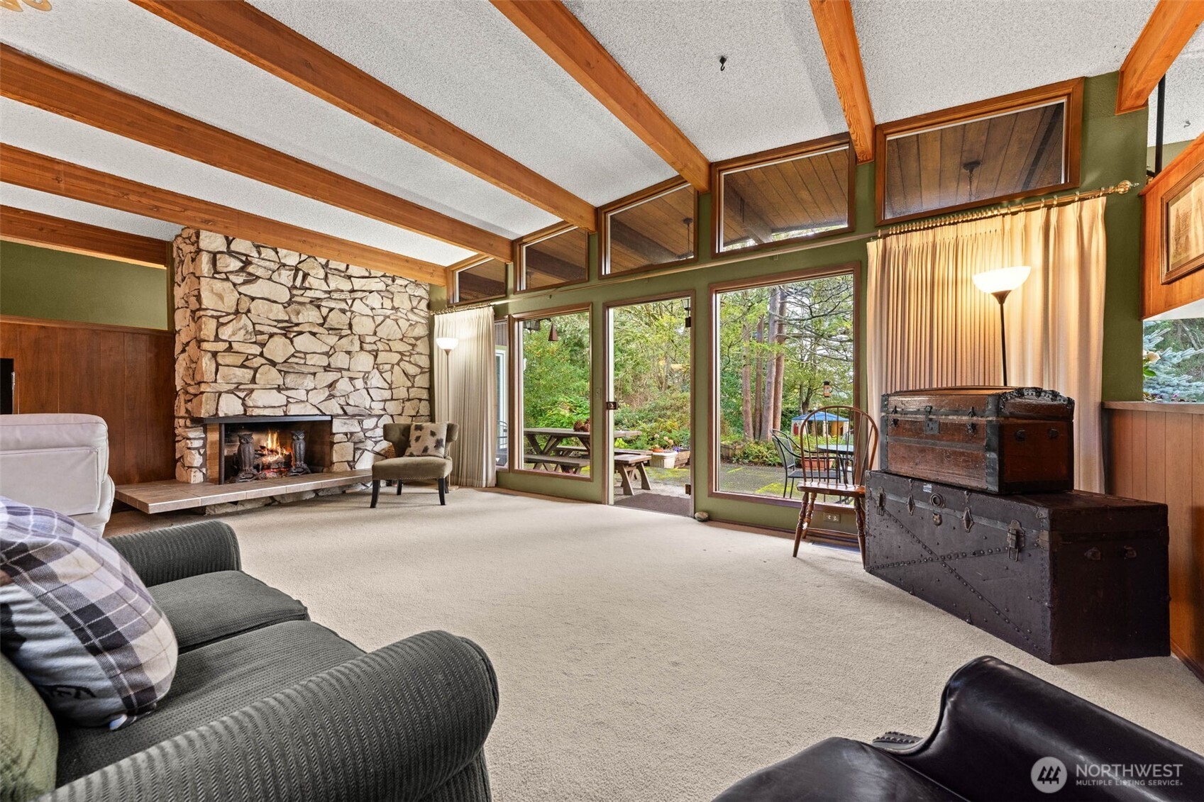 1007 Panorama Court Fircrest, WA 98466 - Photo 14 of 39 a living room with furniture a fireplace and a flat screen tv