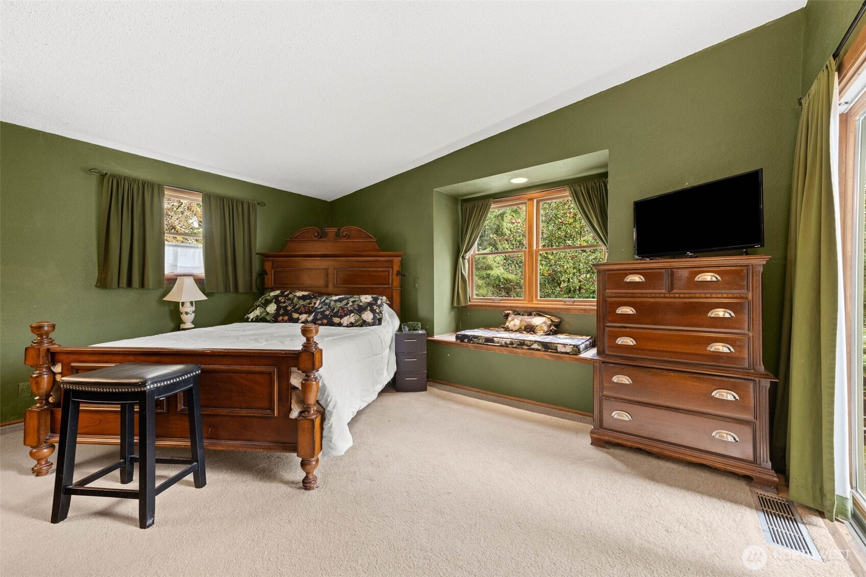 1007 Panorama Court Fircrest, WA 98466 - Photo 24 of 39 a bed room with furniture and a flat screen tv