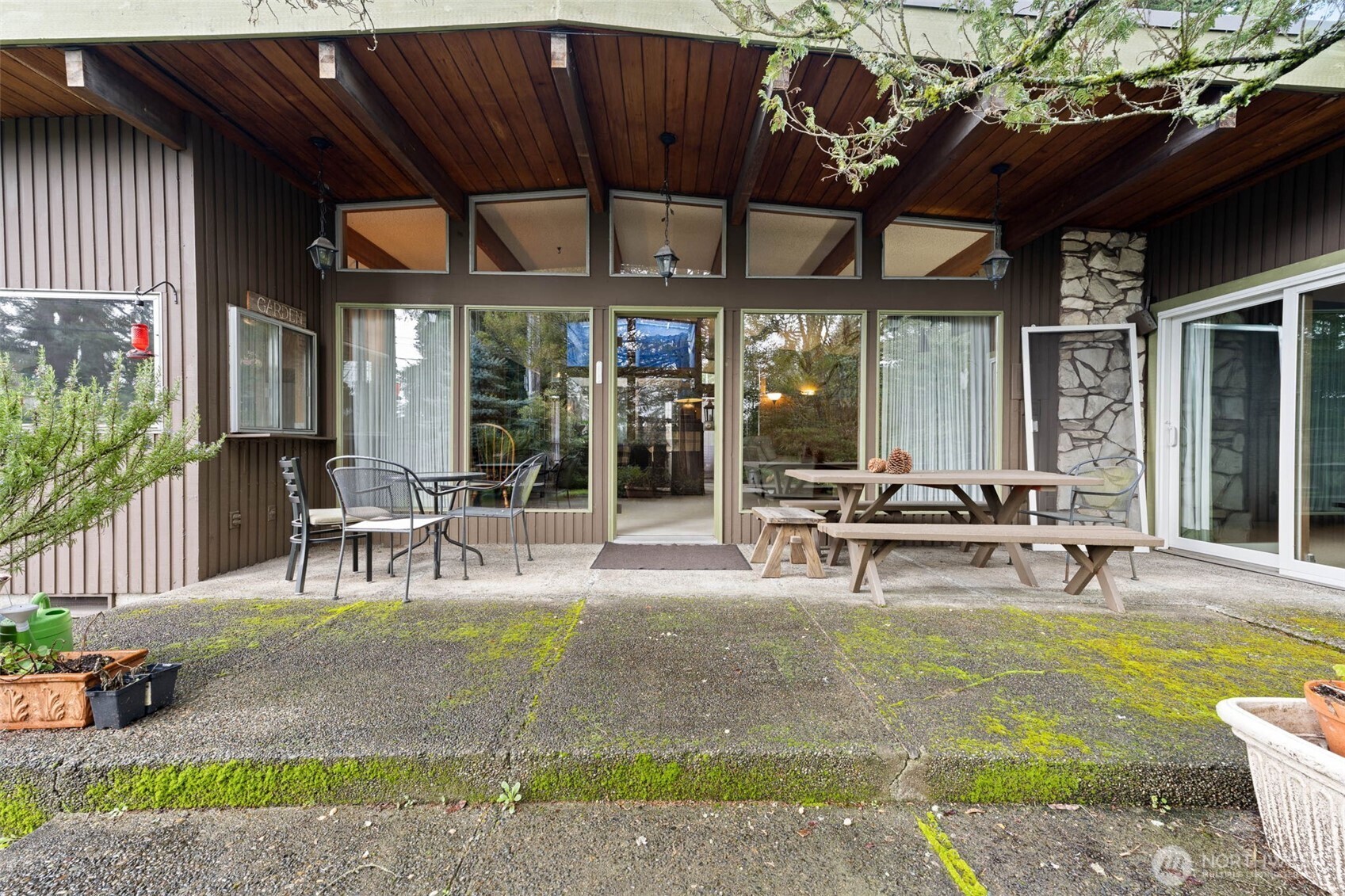 1007 Panorama Court Fircrest, WA 98466 - Photo 27 of 39 a view of a dinning table and chairs in patio