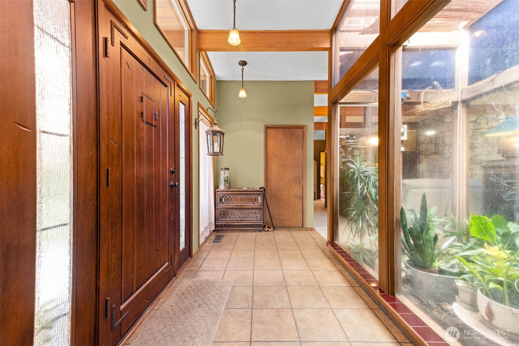 1007 Panorama Court Fircrest, WA 98466 - Photo 5 of 39 a view of a bathroom with a glass door and glass door