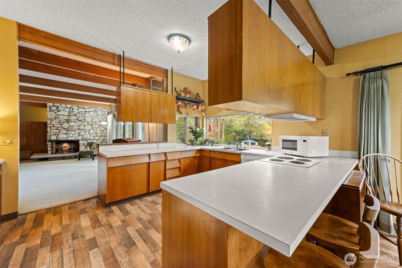 1007 Panorama Court Fircrest, WA 98466 - Photo 9 of 39 a kitchen with stainless steel appliances granite countertop a sink and cabinets