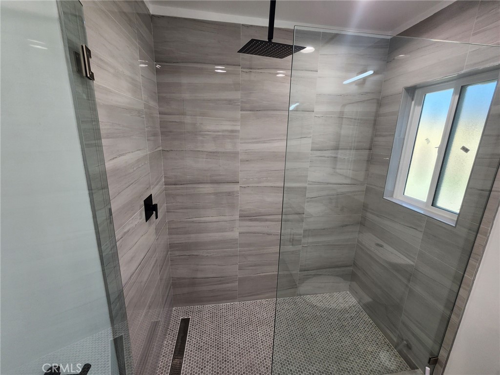 7665 Machrea Street Tujunga, CA 91042 - Photo 4 of 43 a bathroom with a shower
