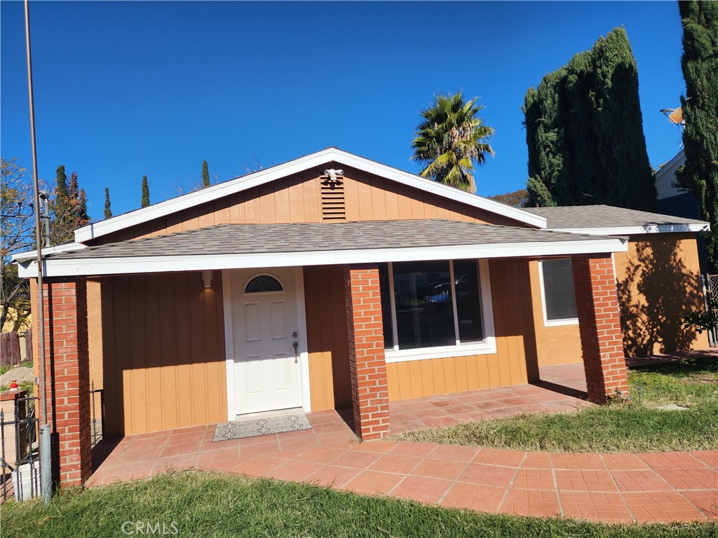 7665 Machrea Street Tujunga, CA 91042 - Photo 41 of 43 a front view of a house with a garden