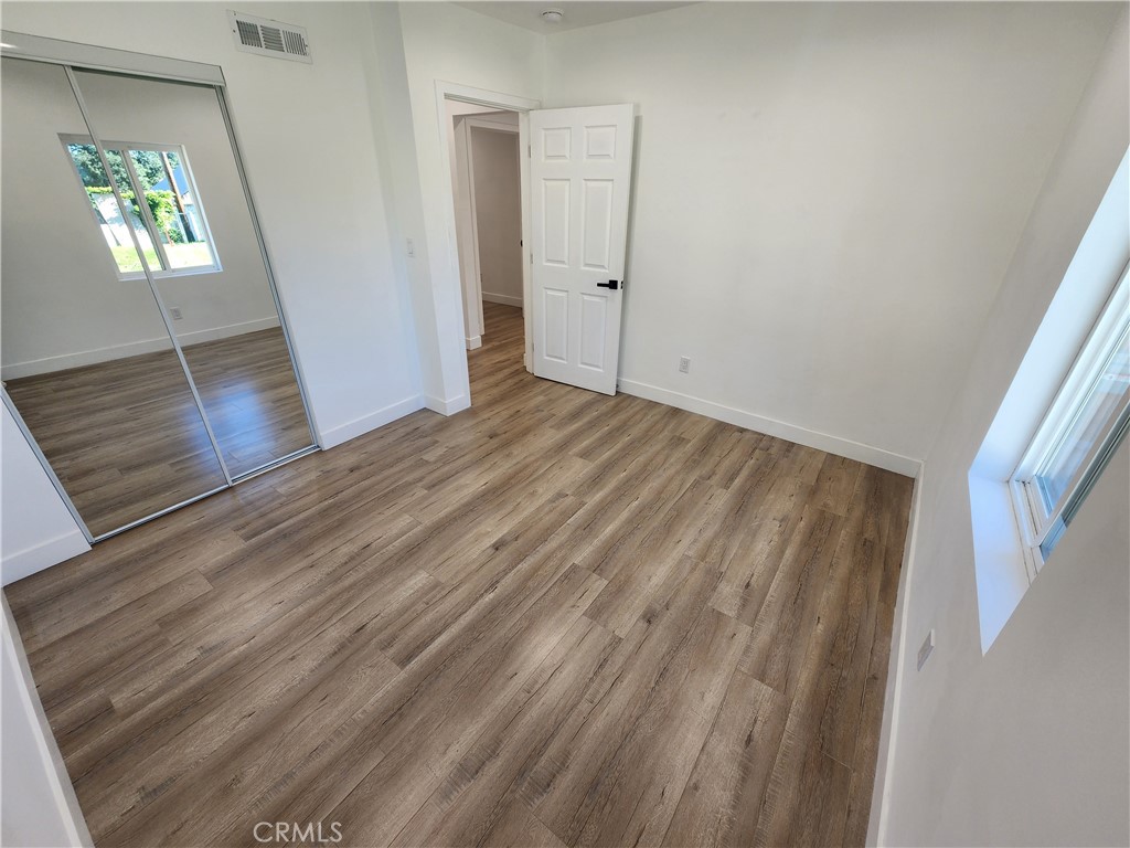 7665 Machrea Street Tujunga, CA 91042 - Photo 8 of 43 a view of an empty room and window