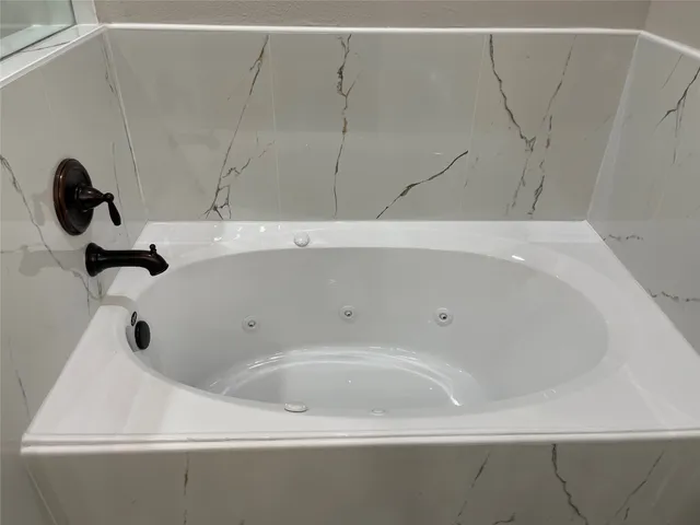 a bathroom with a bathtub