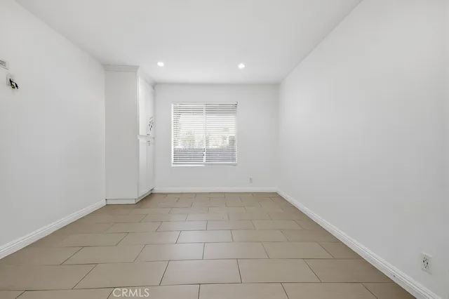 a bathroom with a shower and a toilet