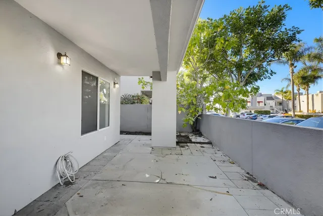 an aerial view of a house with a yard and garden